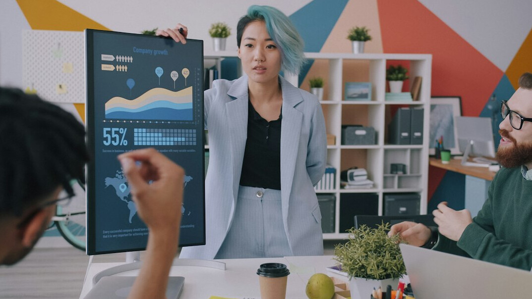 professional giving presentation in office