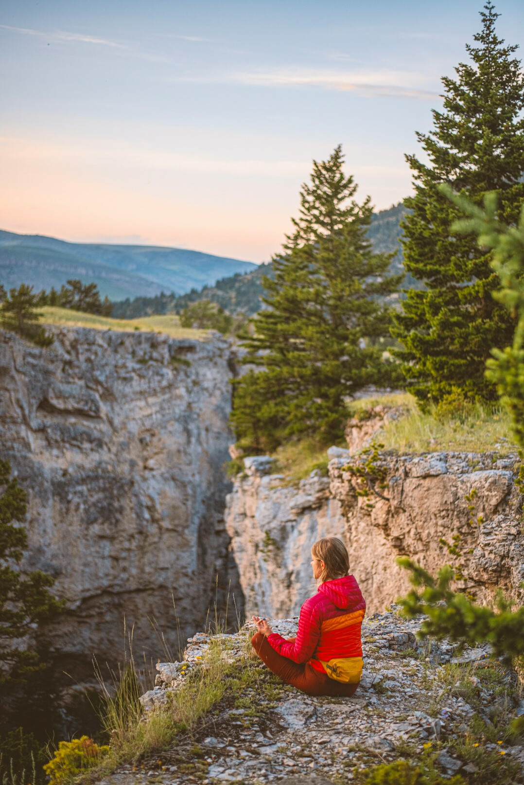 person meditating outdoors