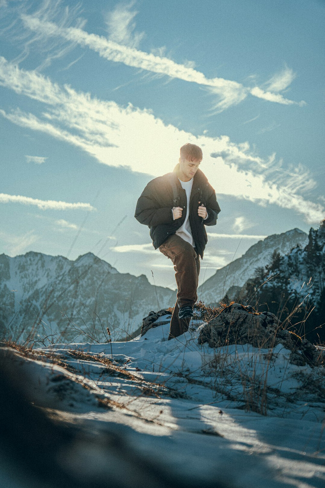 person achieving goals outdoors