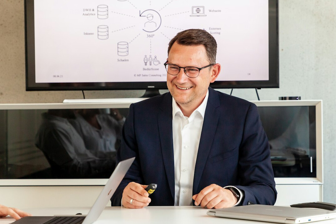 man in business suit networking