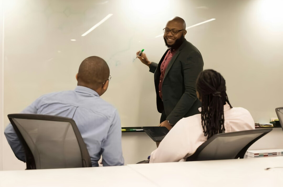 professional giving presentation in office
